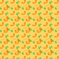 A seamless pattern with slices of tangerine with leaves